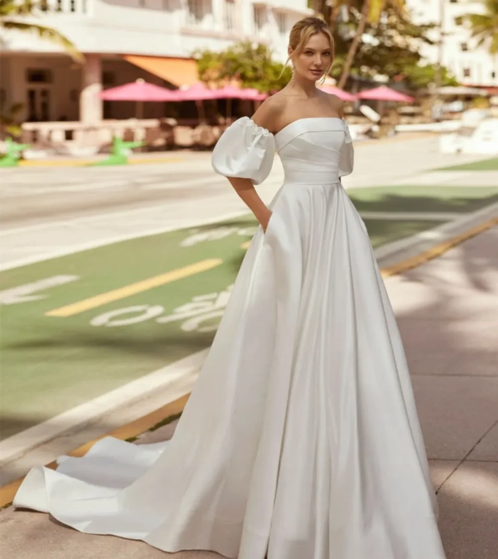 Elegante vestido de novia largo de satén sin tirantes con bolsillo, línea A, marfil, sin mangas, tren de barrido, cubierta de vestido de novia de jardín, botones en la espalda