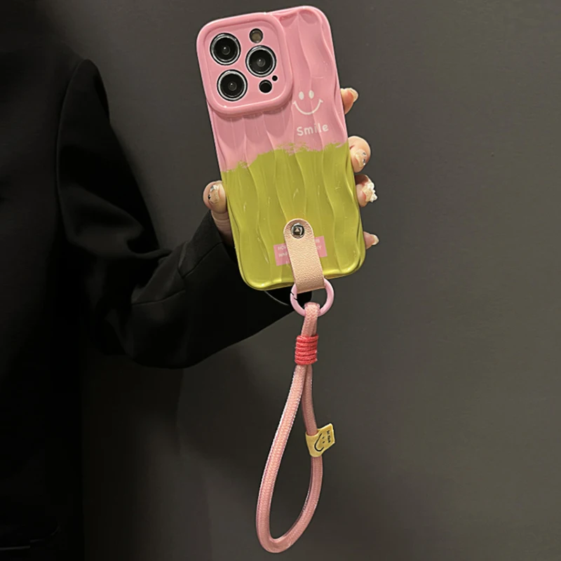 

Simple pink green splicing smiley face for apple 15promax phone case iphone 14promax 13promax 14pro new 13 crossbody