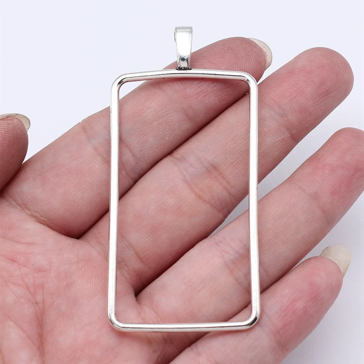 WYSIWYG 10pcs 69x33x2mm Antique Silver Color Hollow Geometric Glue Frame Series Rectangular Frame For Jewelry Making Findings