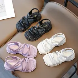 Sandali per ragazze 2024 estate nuova versione coreana per bambini di scarpe da spiaggia aperte con suola morbida per neonate romane