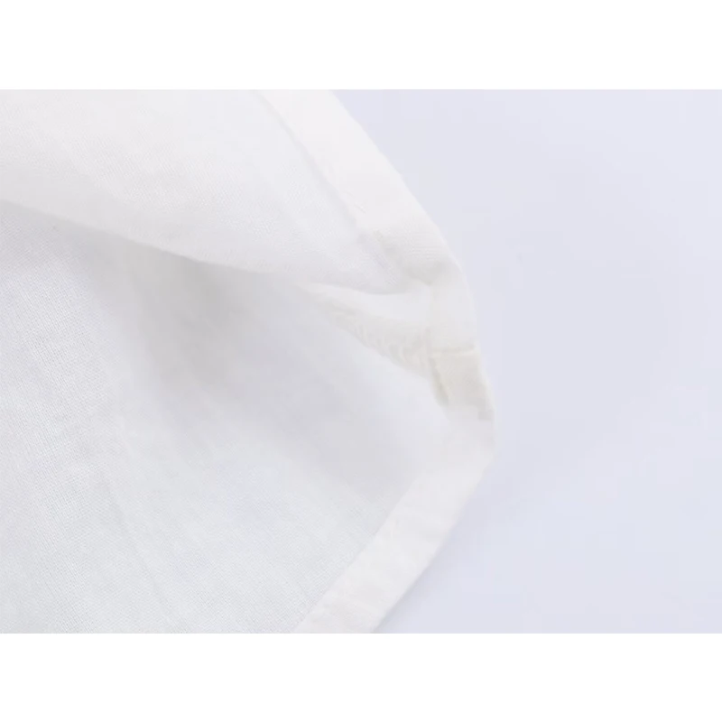 YENKYE بلوزة بيضاء رومانسية على شكل قرص العسل للنساء بأكمام واسعة ورقبة دائرية ملابس علوية غير رسمية لربيع 2026