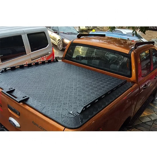 

Алюминиевая жесткая крышка-роллета для кузова пикапов NP300 Vigo Revo Amarok