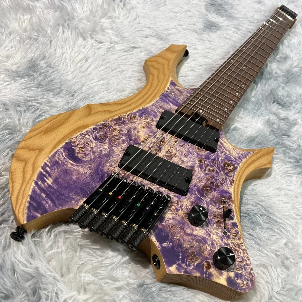 7-string headless electric guitar, 24 frets, fan frets, bone nut, active pickups, titanium alloy string locks, stainless frets,