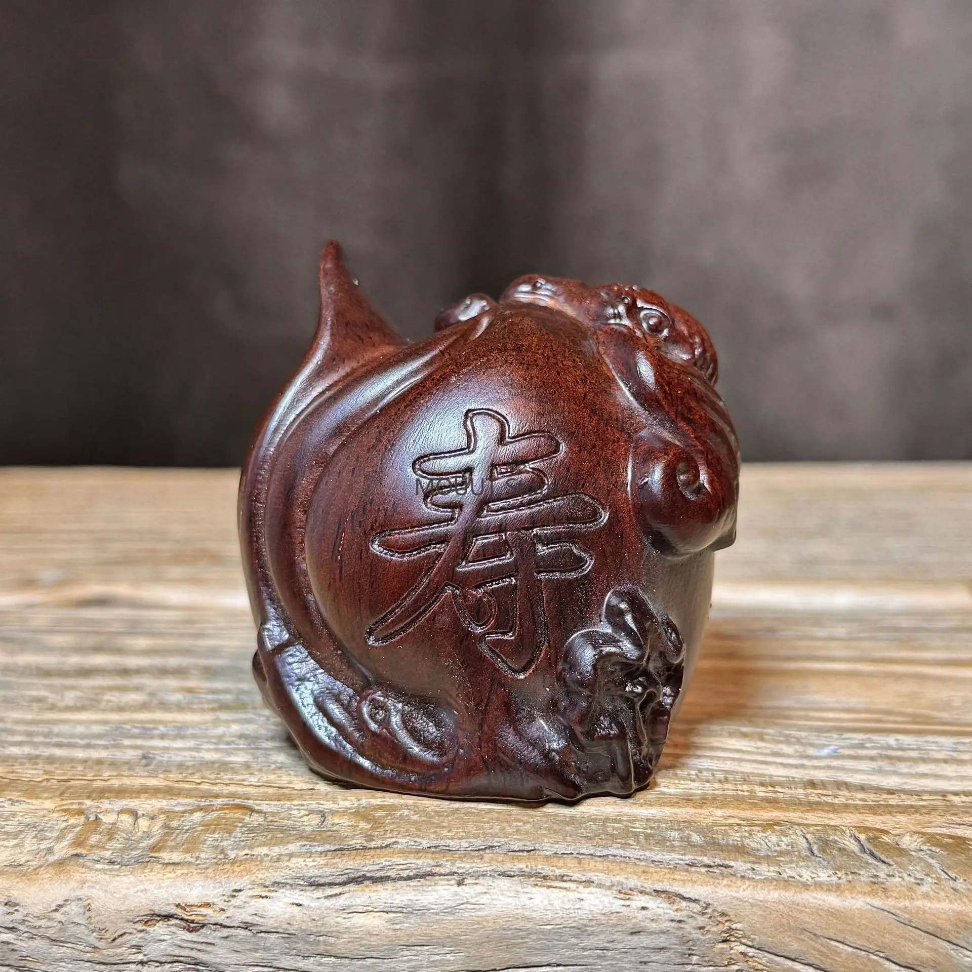 

Ebony solid wood carved longevity peach handle pieces elder birthday gifts Fuxian peach mahogany home desktop stall wholesale