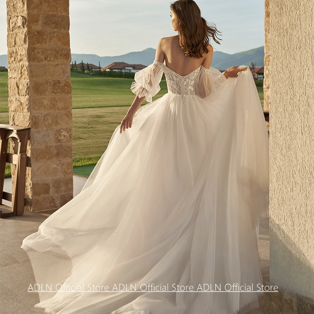 Customized Wedding Dress Bridal Gown New Arrival Puff Sleeves Boat Neck Beading Sequined Sweep Train Illusion Bride Dress
