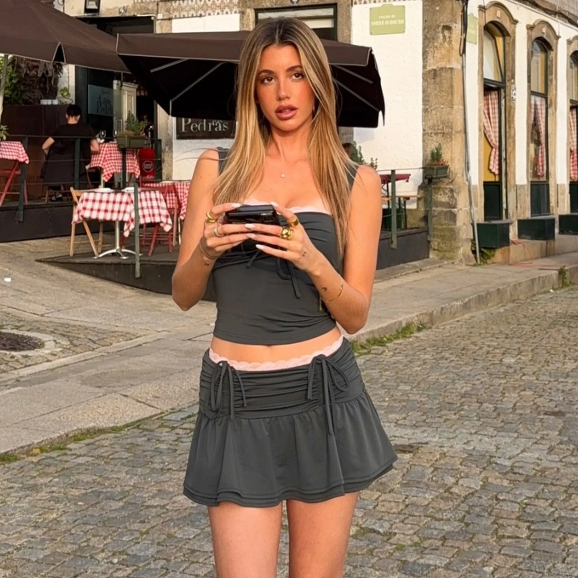 

Европа и Америка ветер лето новый женский сексуальный пряночный слинг тонкий плиссированный топ мини-юбка костюм женский