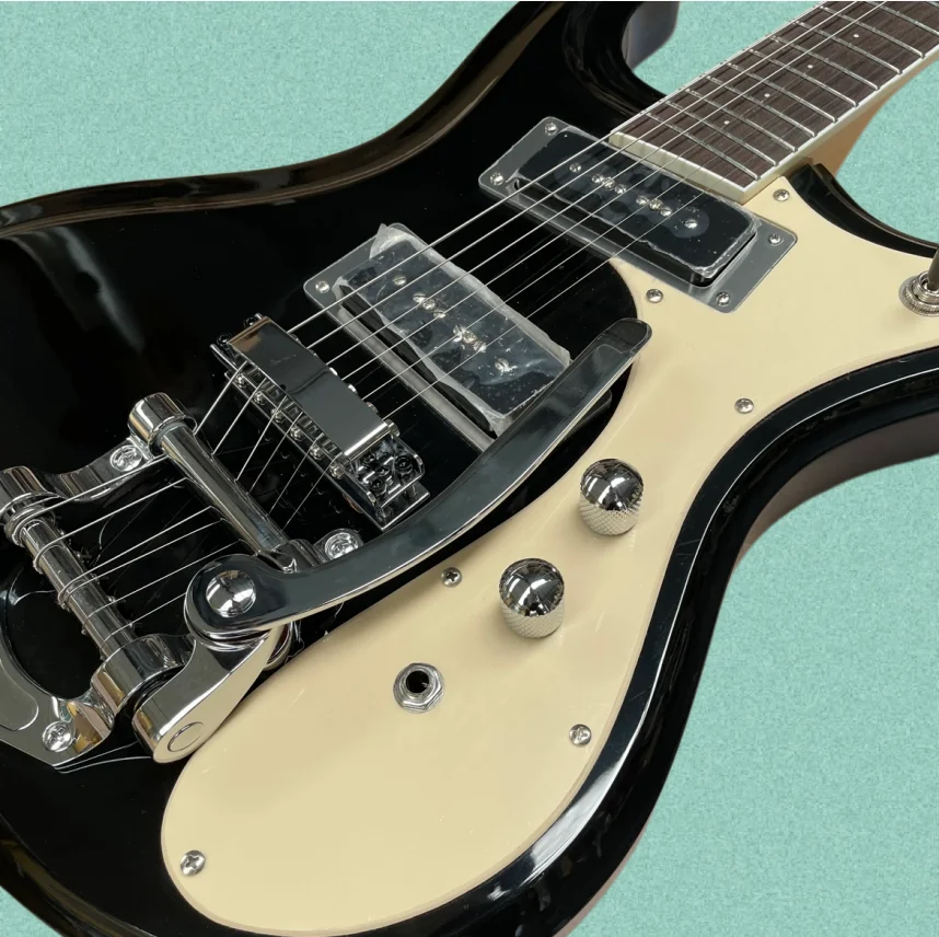 Electric Guitar Beginner - Black 6-string electric guitar with beige