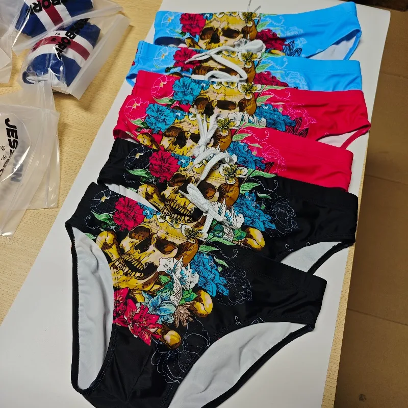 2026 Combination Printed swimming trunks men's sports beach swimsuit punk personality European and American men's briefs 10003