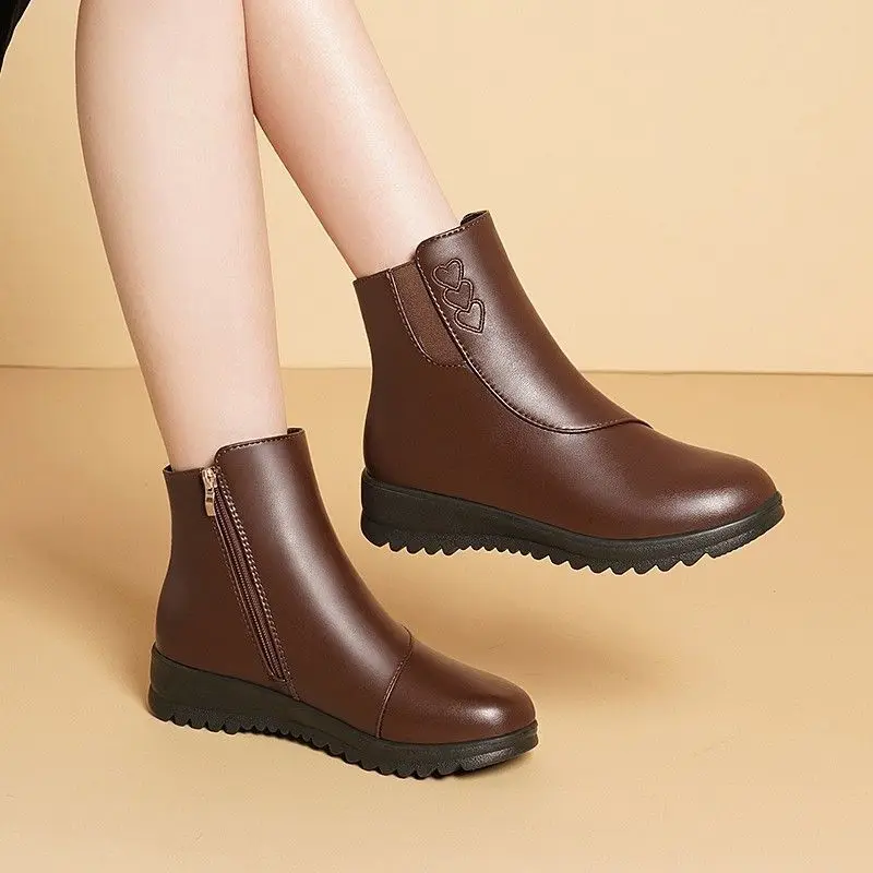 Plana com costura botas modernas dedo do pé redondo sapatos femininos de salto baixo à venda 2025 moda sólida zíper tornozelo botas femininas concisas