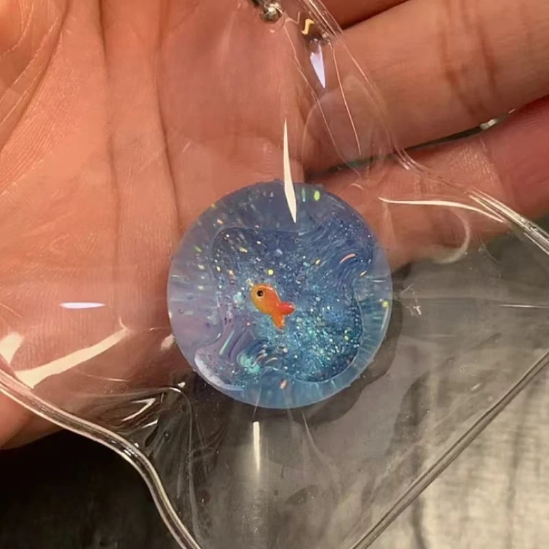 1 ud./3 uds. Nuevo océano azul planeta pez dorado juguetes para apretar muñeca de liberación juguetes para aliviar el estrés con bolsa de PVC para niños accesorios colgante