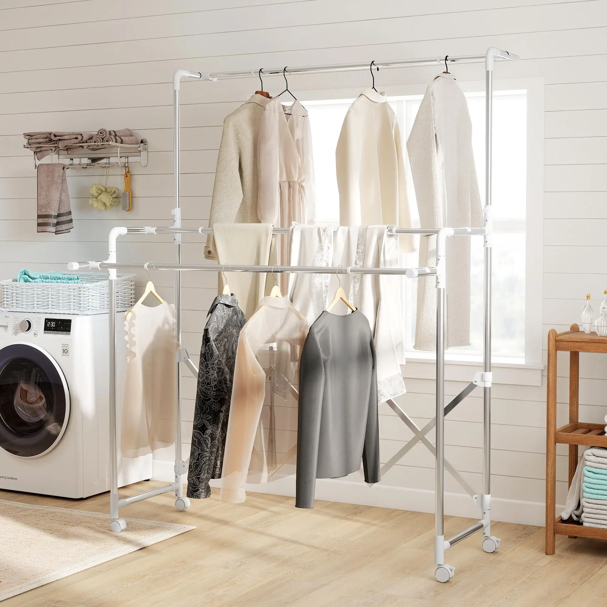 Séchoir à linge multi-niveaux pliable et mobile avec trois barres télescopiques, structure en acier inoxydable, couleur argent