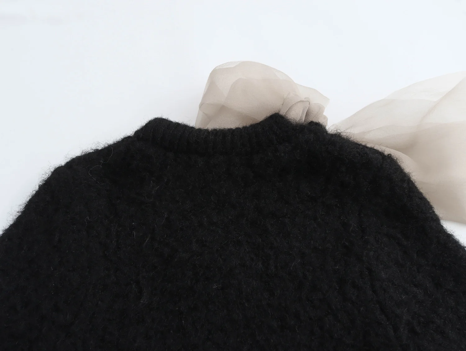 Autunno e inverno nuove donne abbigliamento dolce trasparente filato duro decorazione fiocco maglione lavorato a maglia a maniche corte