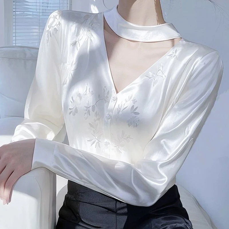 2025 printemps automne nouveau tempérament Jacquard impression couleur unie col rond à manches longues Blouse dames mode évider dessus de chemise