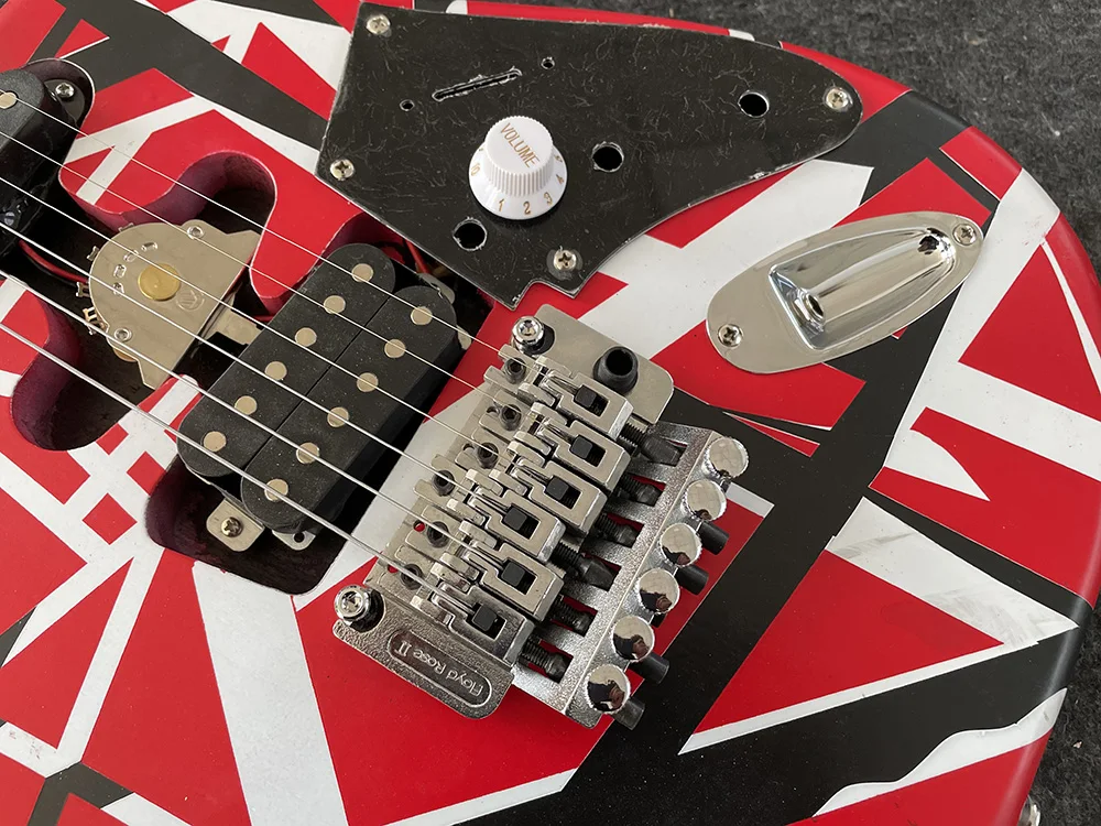 Electric Guitar with Tremolo Leaning Bridge Pickup,High Quality, Red, Black and White Stripes,free shipping