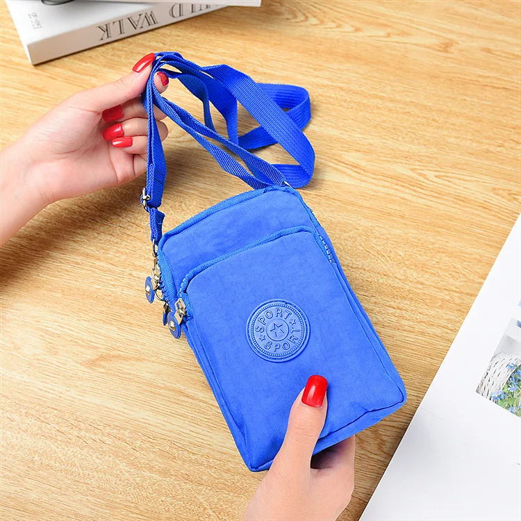 Crossbody bag cell phone bag pocket change organizer zipper wrist nylon neck running