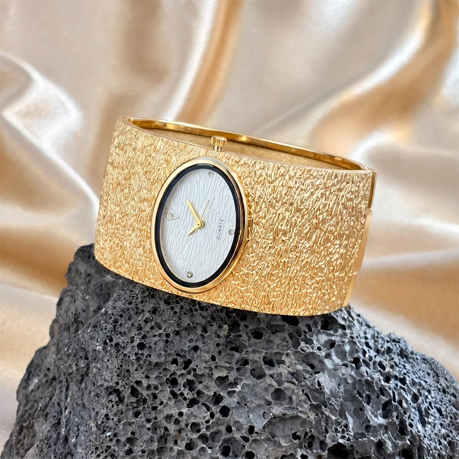 Gold Watch for Ladies: Flattened Oval Dial Tree Bark Texture Bangle Opulent Luxury Women's Wrist Watch
