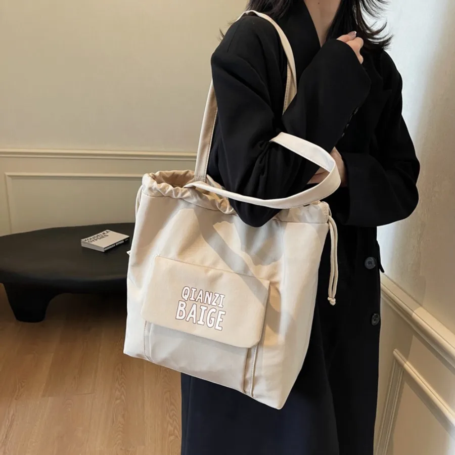 

Fashion Casual Textured Trend-Setting Handbag Drawstring Solid Color Casual Shopping Bags Commuting Single-Shoulder Women's Bag