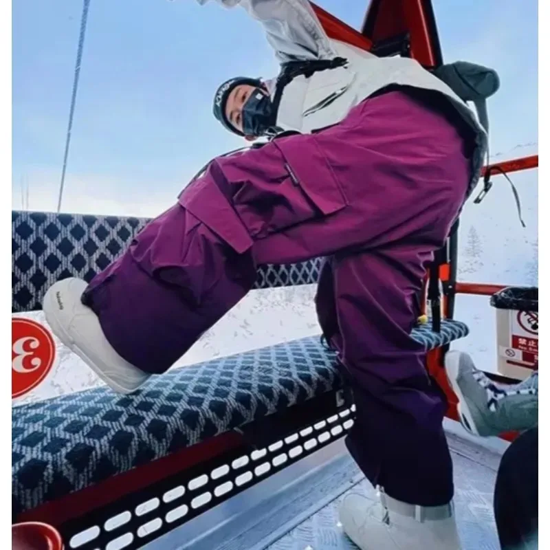 سراويل تزلج سميكة دافئة للرجال والنساء سراويل تزلج مقاومة للماء على الطراز الأمريكي للتزلج على الجليد