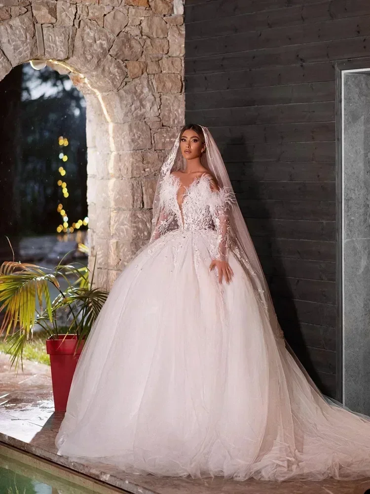 Customized Luxury Feather Illsion Long Sleeves Wedding Dress Robe De Mariée  Appliques Beads Puffy Ballgown Bridal Gown