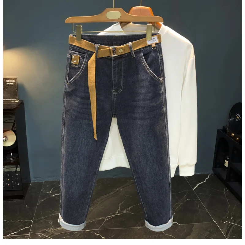 Primavera e outono novos jeans masculinos na moda versátil moda cinto estilo pequeno pé elástico casual haren tendência high-end