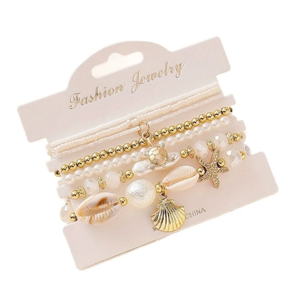 7pcs/Set Faux Pearl Layered Bracelets Sea Shell Starfish Charm Stackable Bracelets Layered Design Rice Beaded
