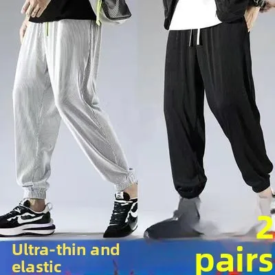 Pantaloni casual di marca alla moda sottili estivi da uomo in seta di ghiaccio Pantaloni per il tempo libero con risvolto ampio a nove punti Gamba dritta Sensazione di freschezza