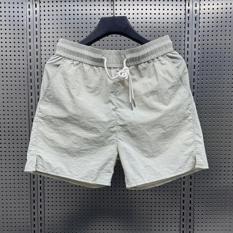 2025 summer thin ice silk shorts, loose and fashionable casual three part pants, drawstring men's solid color beach pants