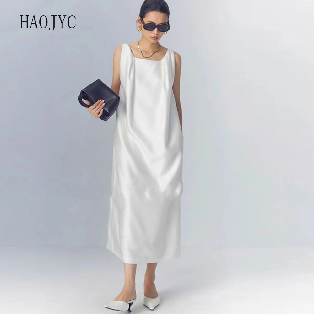 

2025 French high-end simulation silk imitation wool white three-dimensional kinked sleeveless black dress women