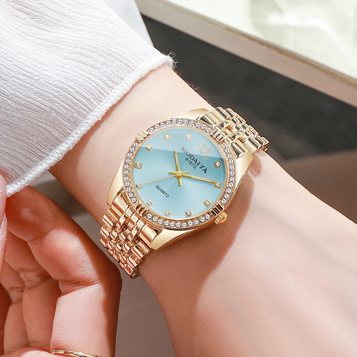 Luxury Women's Quartz Watch, Rose Gold Tone with Crystal Bezel, Light Blue Dial, Elegant Style