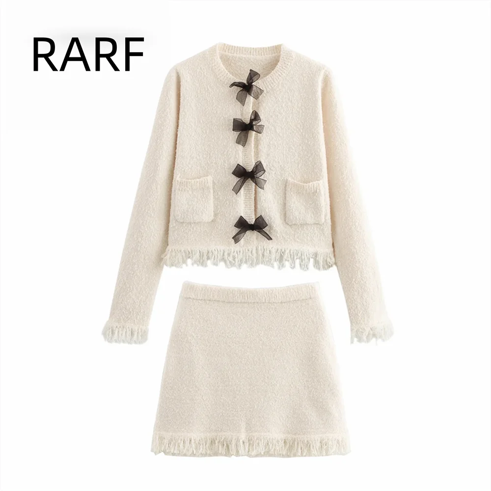 Autumn and winter new French bow decoration round neck tassel long sleeved knitted jacket mini skirt set