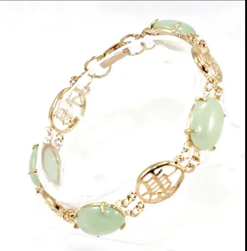 

Women's fashion gold plated Fu character Accessories + egg shaped Dongling Stone Bracelet