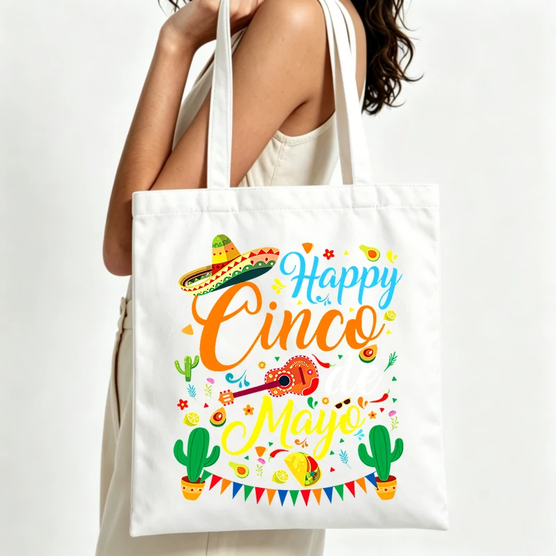 Cinco de Mayo graphic canvas tote bag with sombrero and cactus print, perfect for casual summer outings and festive celebrations