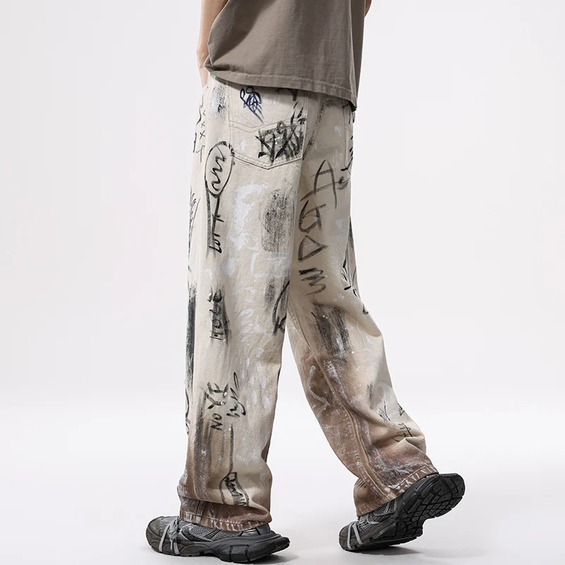 Celana jins pria, celana jins Denim longgar kasual Hip Hop, celana jins Streetwear mode, celana Graffiti jalanan Amerika