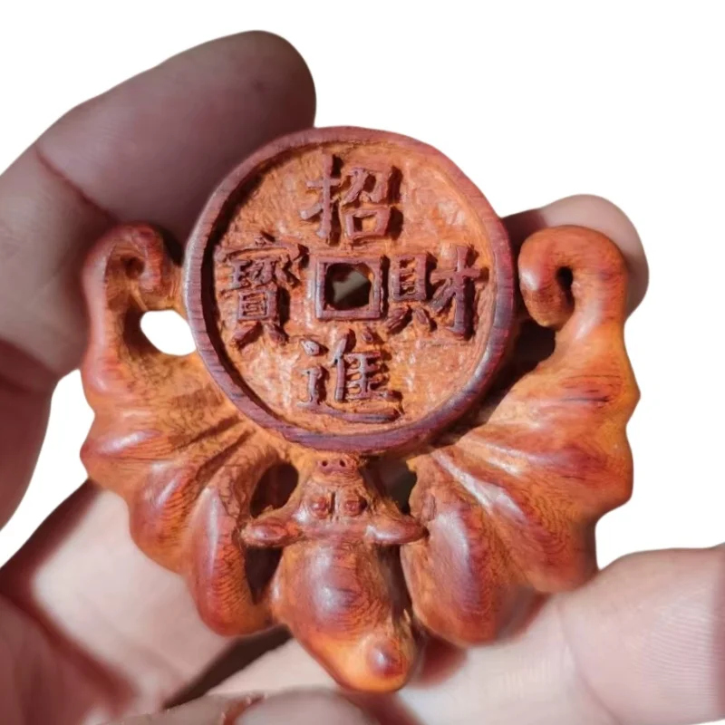 Traditional folk hand carved handle pieces symbolize wealth and prosperity