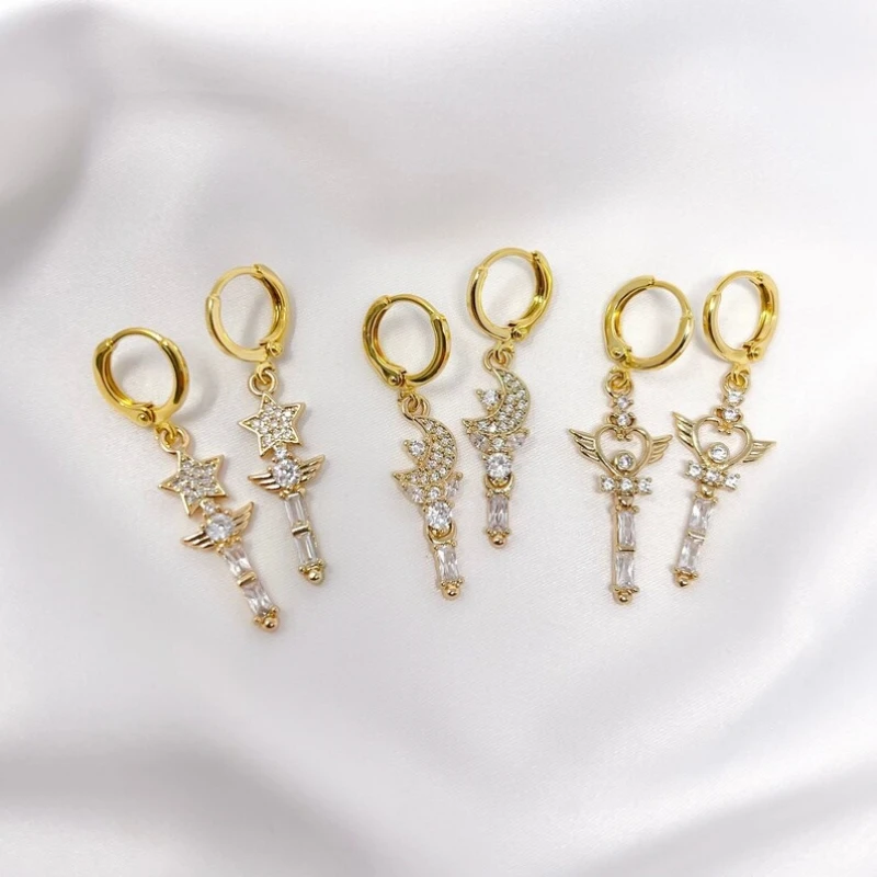 Gold plated angel star, moon, or heart wand charm earrings with cubic zirconia cz accents and gold plated mini huggie hoops