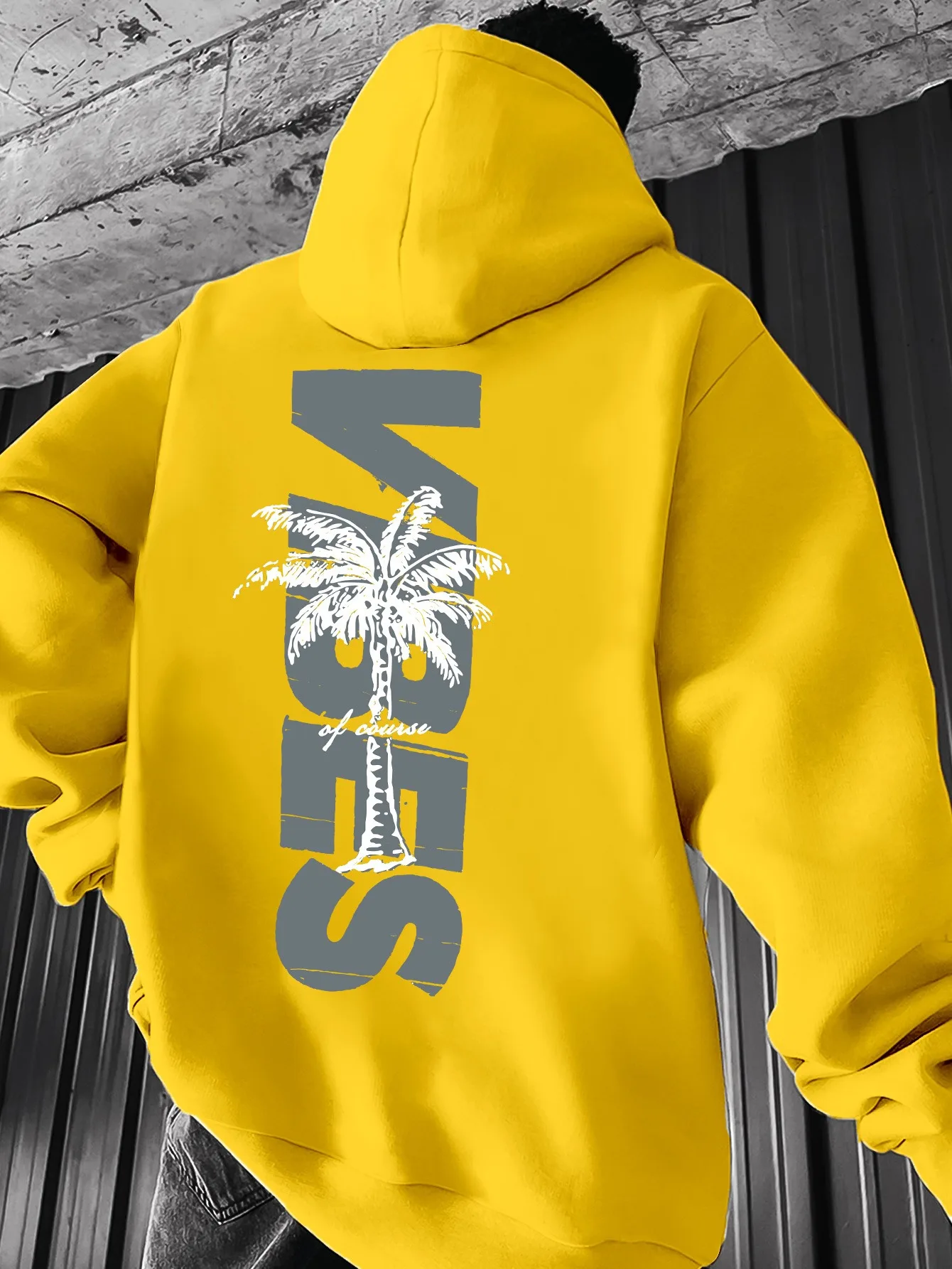 Tropical atmosphere men's loose-fitting hooded shirt with retro distressed palm tree lettering on the back of the shirt.
