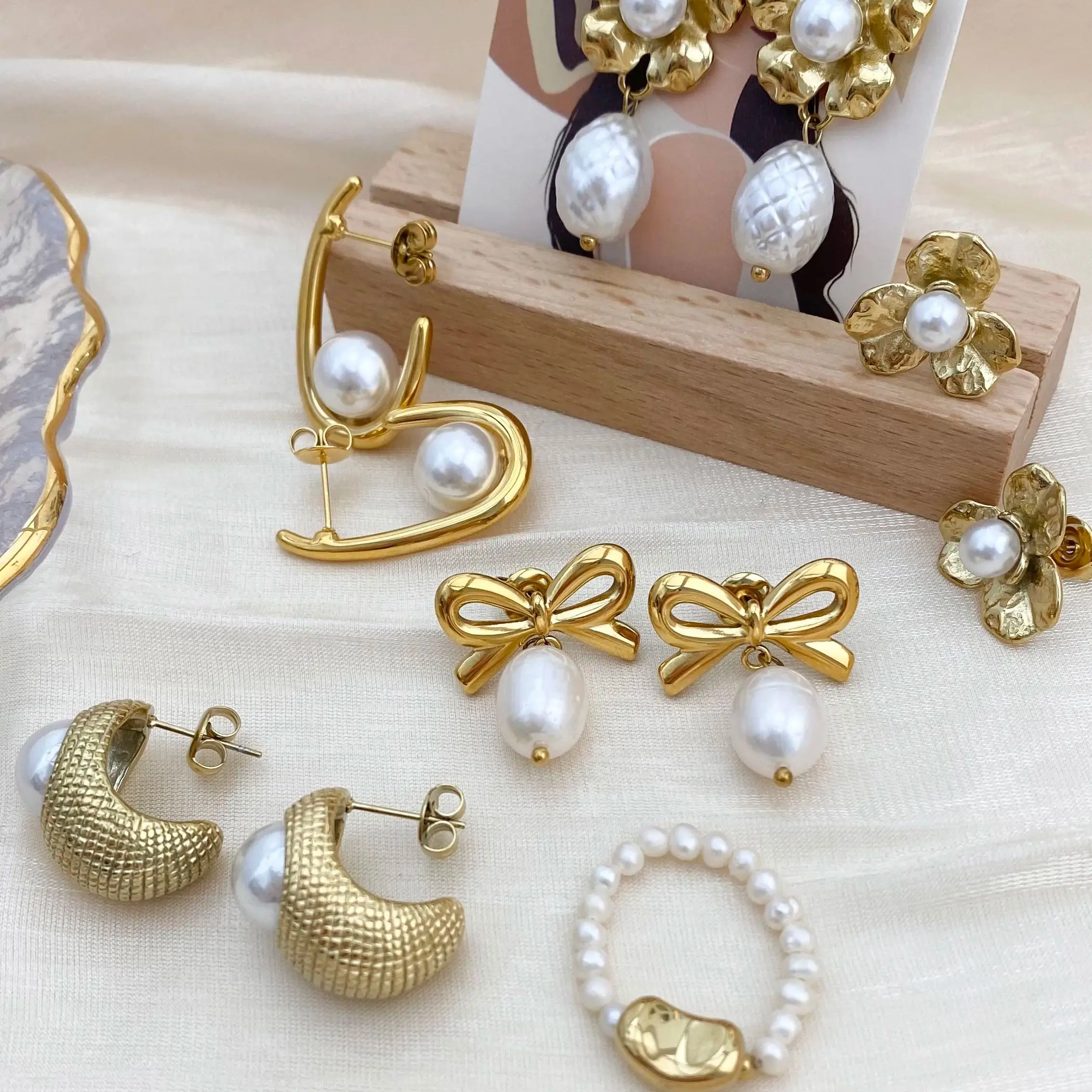 

CARLIDANA French Design Stainless Steel Gold Plated U Pearl Bow Flower Earrings for Women's Fashion High Quality Luxury Jewelry