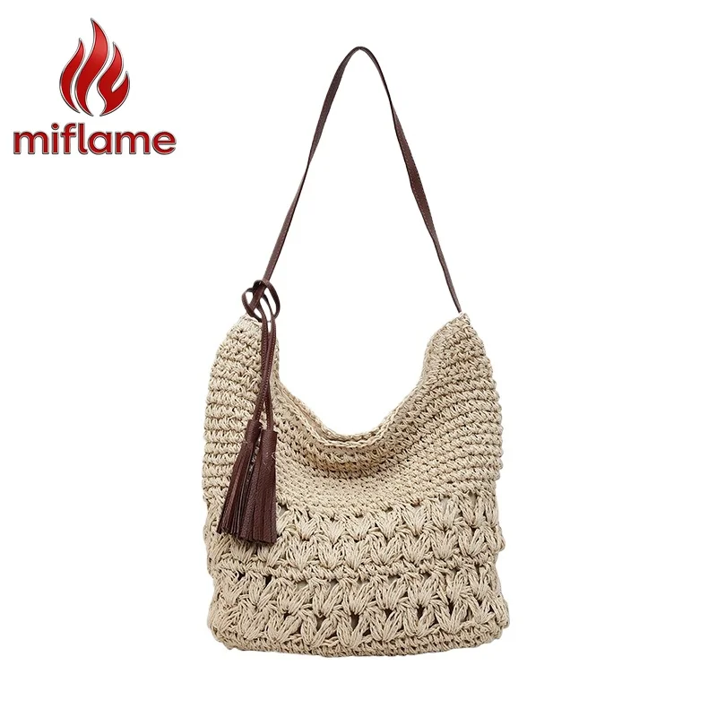 

Women's Boho Handmade Woven Straw Shoulder Bag with Tassel Hollow-Out Design Lightweight Spacious Summer Beach Vacation