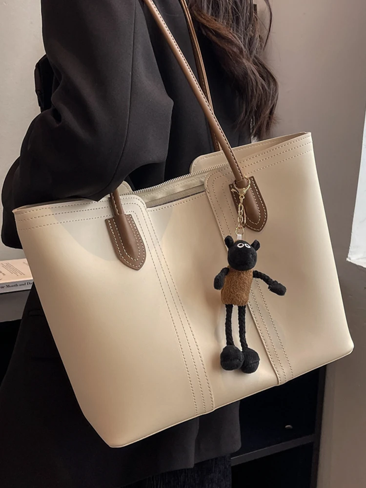 

2025 new women's waterproof pu leather large capacity commuting tote bag fashionable all-match handbag Korean version shoulder