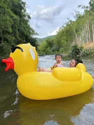 Inflatable big yellow duck swimming ring mount water floating pad, children's toys adult floating bed