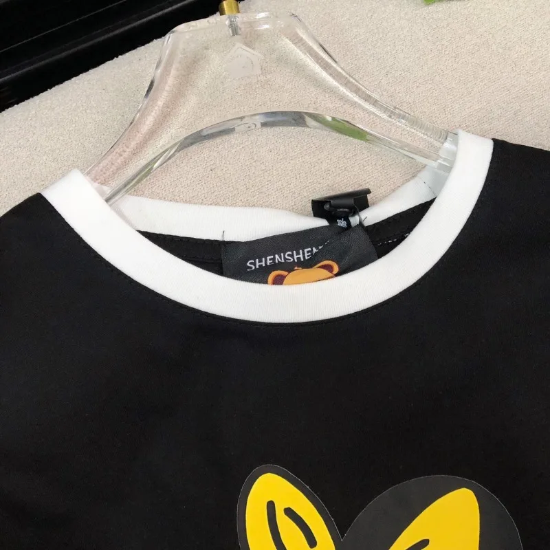 Wiosenne letnie koreańskie czerwone koszulki z krótkim rękawem swetry Retro kontrastowy kolor krawędzi projekt nadruk kreskówkowy krótki Casual top z krótkim rękawem