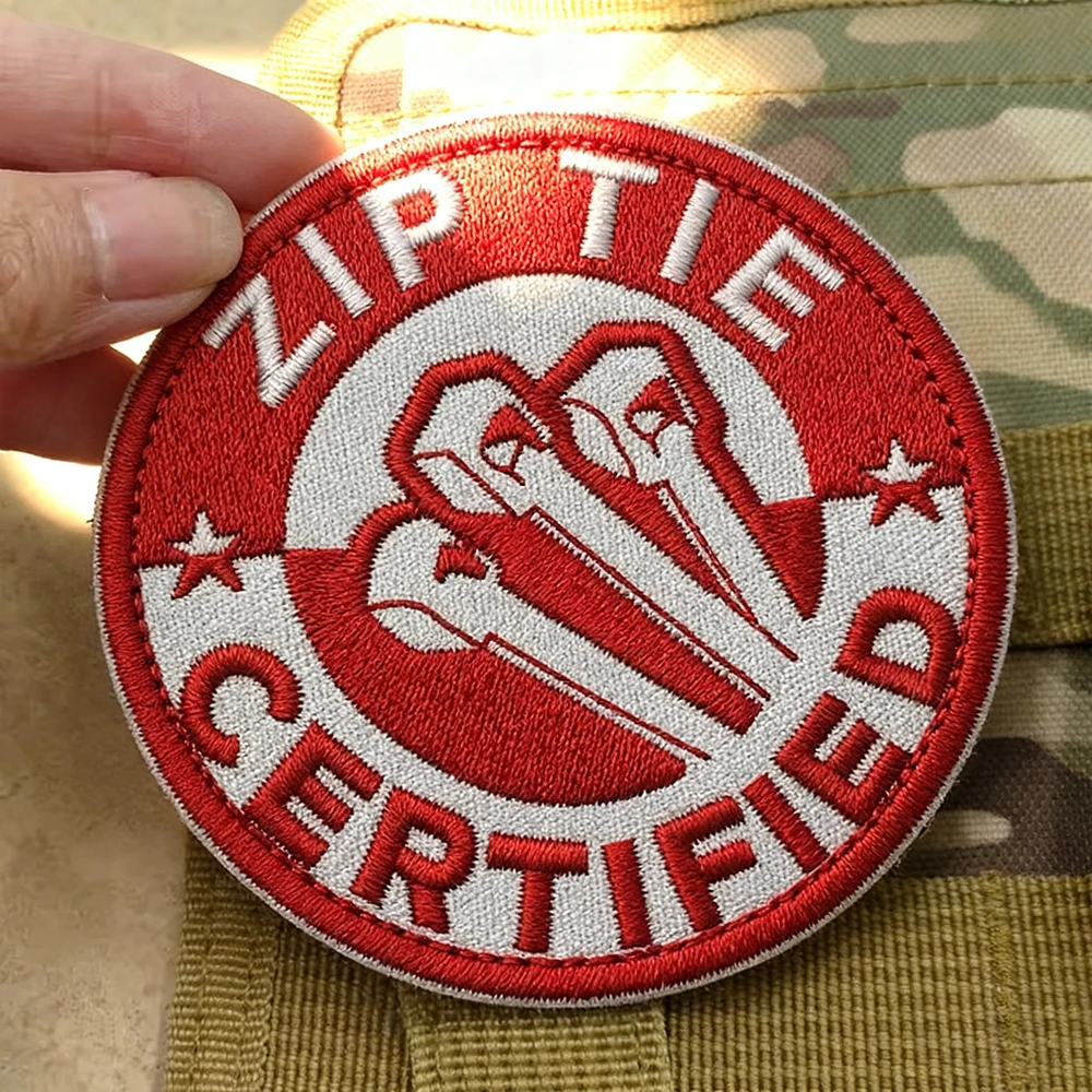 Militärischer taktischer Armband-Rucksack mit Klettverschluss und drei Kabelbindern, computergestickter Reißverschluss, zertifiziert