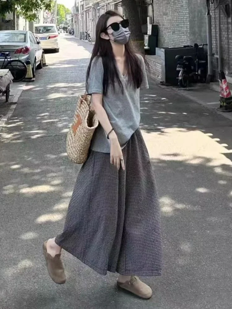 

plus Size Women's Wide Leg Pants Skirt Set Elastic Waist Loose Fit Summer Casual Anti-Aging Style plus Size T-Shirt Two-Piece...