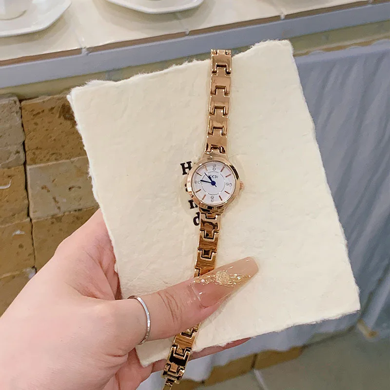 versatile small fresh student quartz watch fashion trend light luxury simple waterproof women's steel belt watch birthday gift