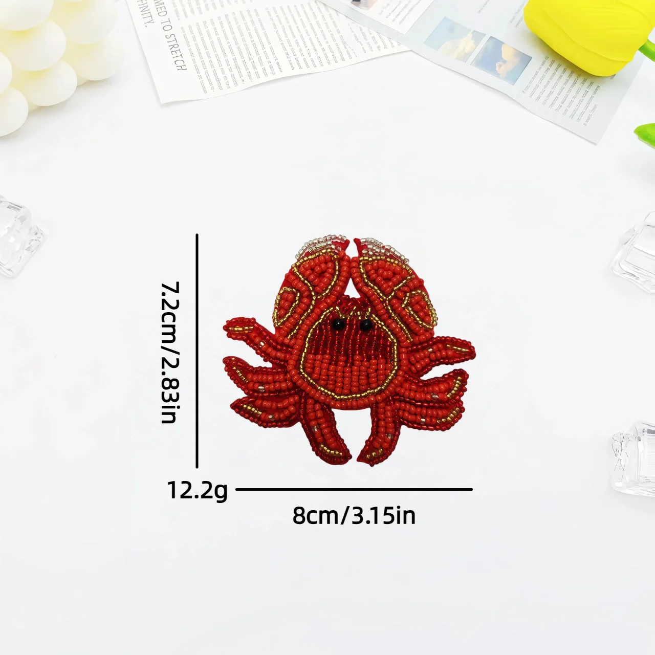 Cute marine animal appliqués featuring crabs, lobsters, and deer, adorned with beaded embroidery.