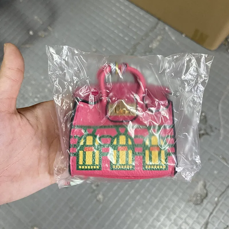 1 Stück modische Joker Mini Tide Druckmünzbörse, tragbare Kopfhörer- und Kleingeld-Aufbewahrungstasche, Anhänger, multifunktionale Tasche – Detail 2