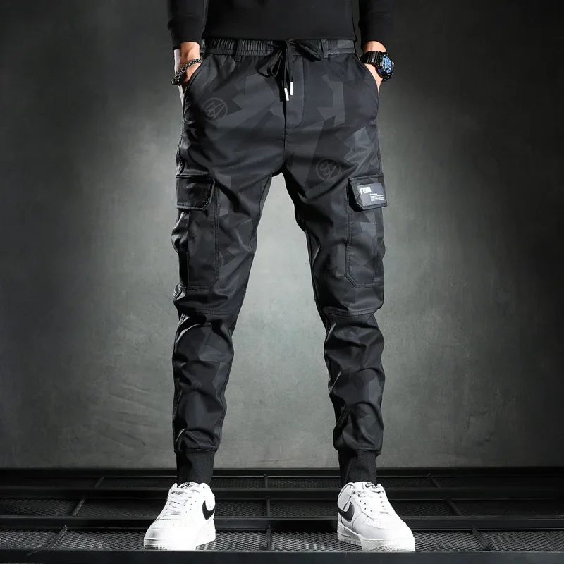 Pantalones informales de camuflaje para hombre primavera otoño estilo fino nueva versión coreana ajustada cintura elástica moda