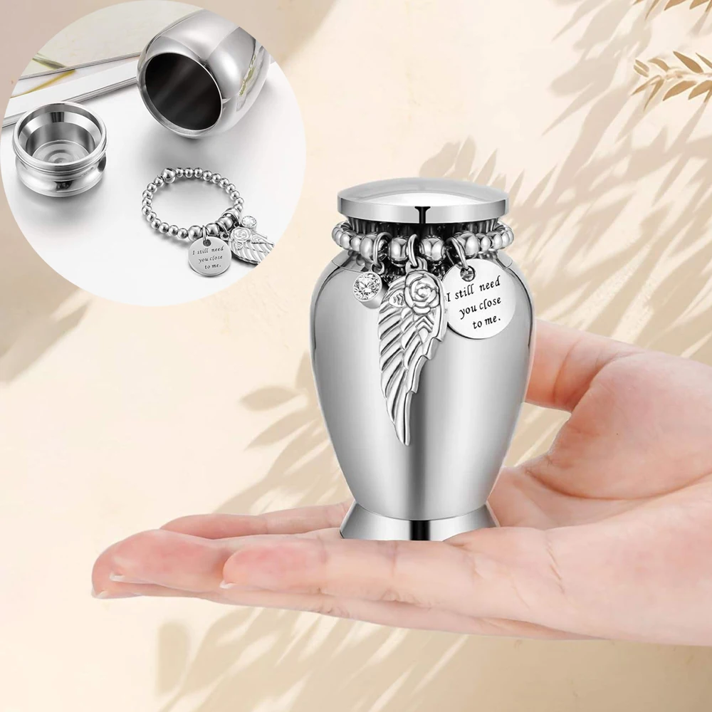  Urnas de recuerdo pequeñas para cenizas humanas conmemorativas de 2,83 pulgadas con dije de ala Mini urnas de cremación aleación de aluminio