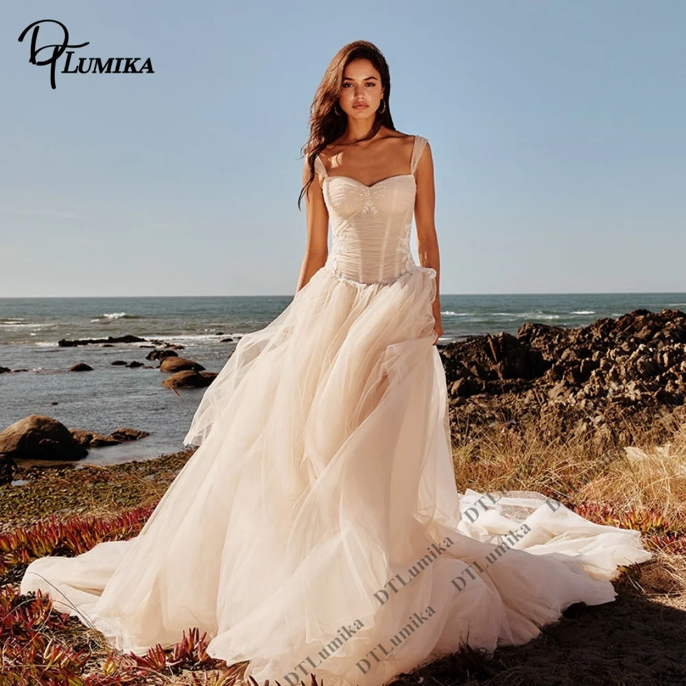 Champagne Tulle Wedding Dress 2026 Spaghetti Strap Backless Bridal Gown Long Train Romantic Beach Wedding Dresses Custom Size