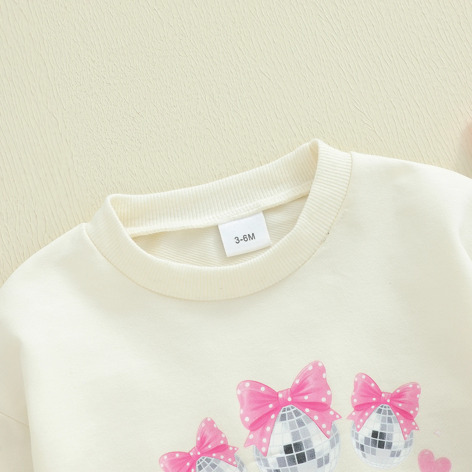 بدلة رومبير للفتيات الصغيرات في السنة الأولى للعام الجديد مطبوع عليها حروف على شكل فيونكة وأكمام طويلة ورقبة دائرية بدلة قفز 2026 #6